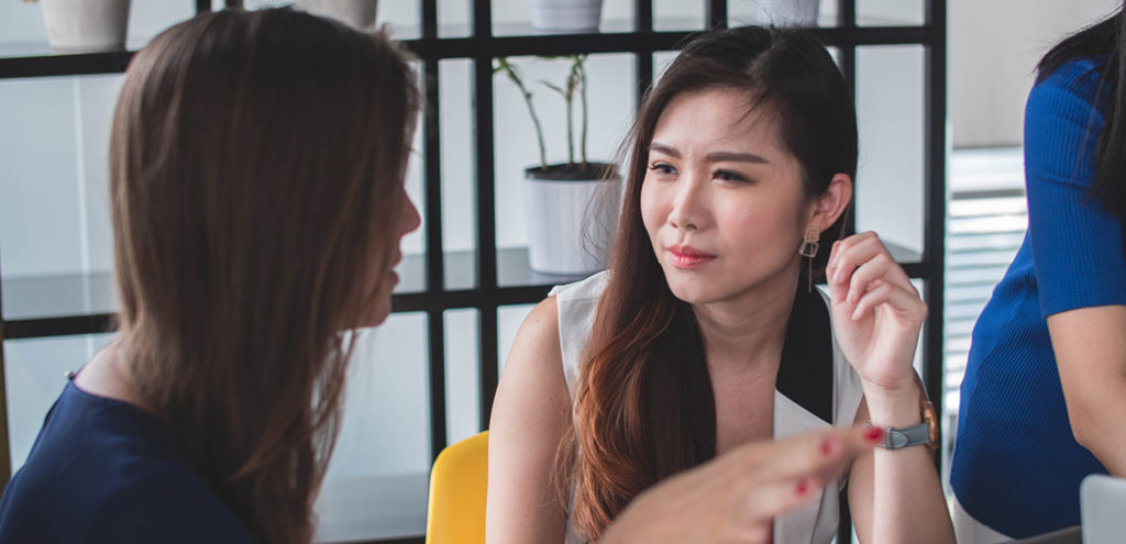 A REALTOR has a conversation with a client