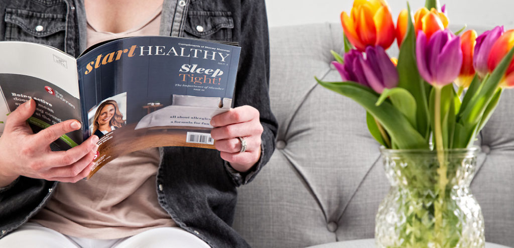 A real estate client reads Start Healthy magazine
