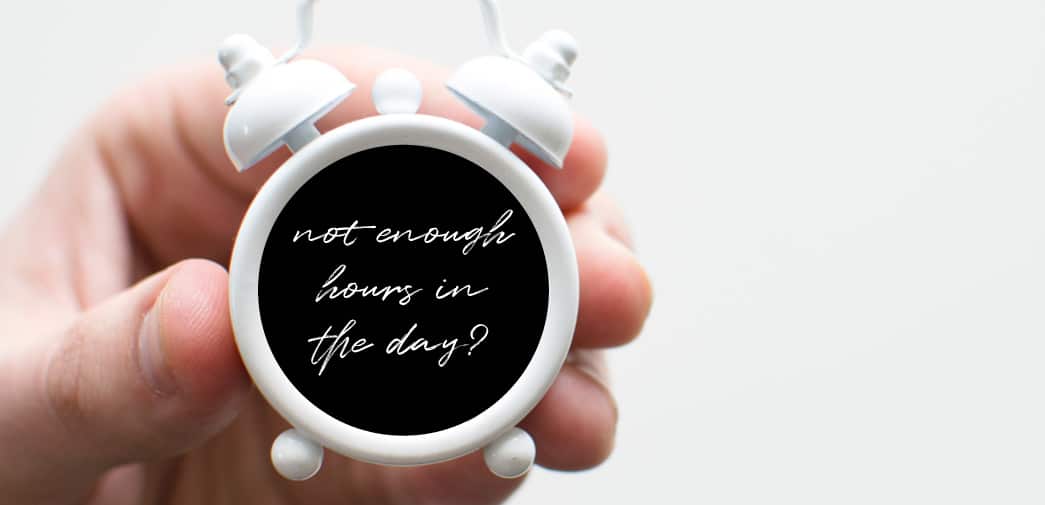 A clock; On its face, it says "Not enough hours in the day?"