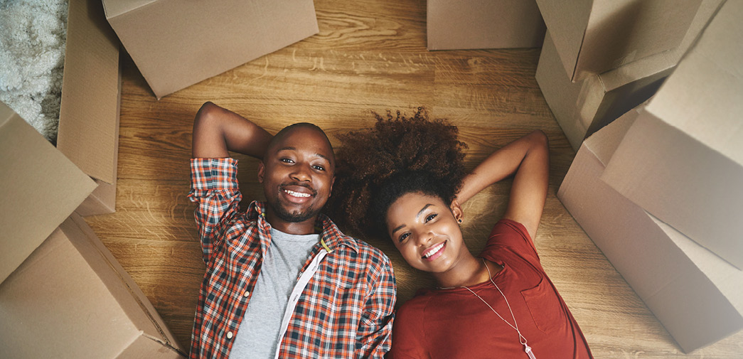 First-time home buyers smiling