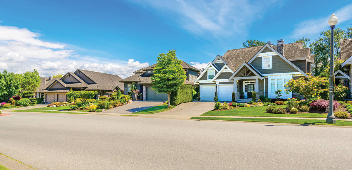 street view of homes with blue sky